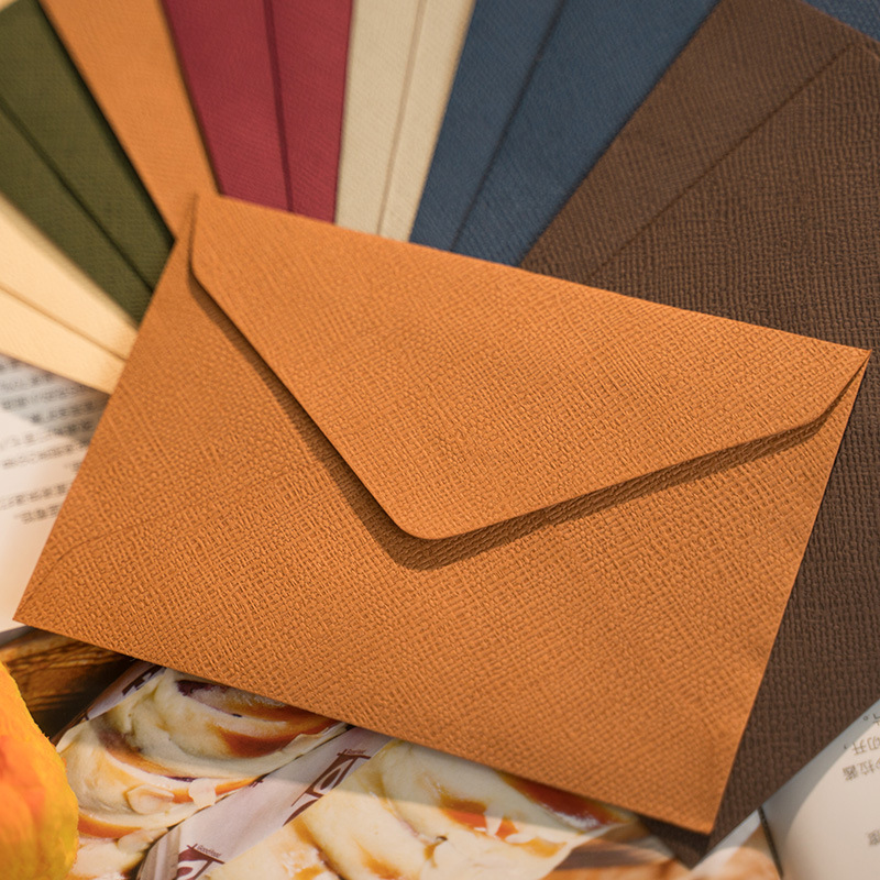 10枚入り、16×11.3cmの封筒。麻織りの模様と炎の絵柄 - Wax Seal Letter Kit のレビューと価格